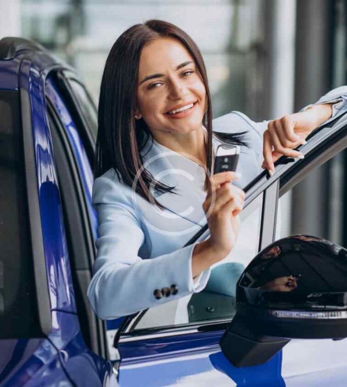Auto body technician repairing vehicle damage